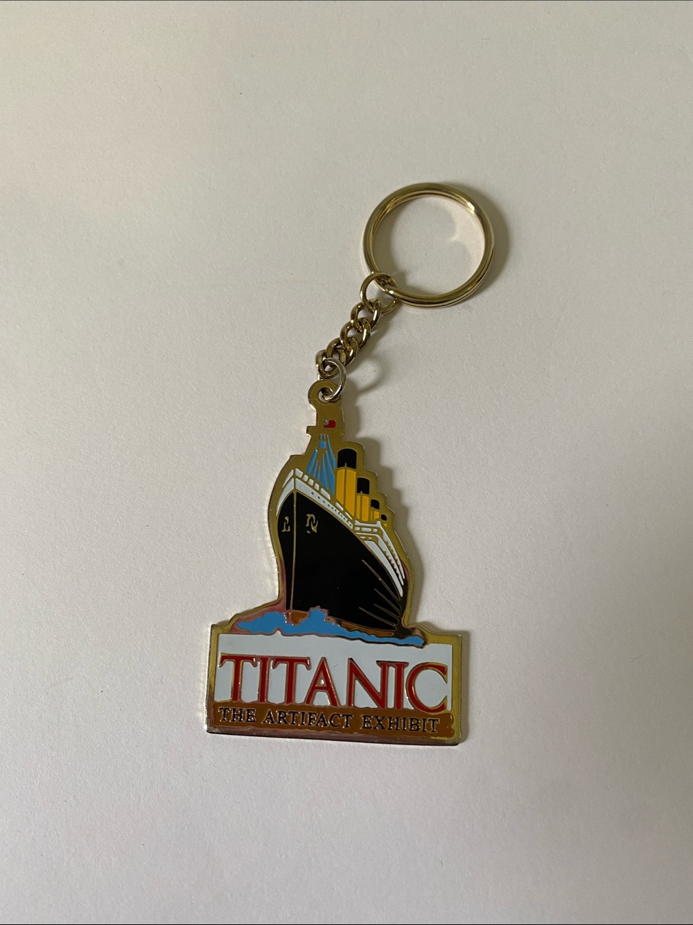Titanic the Artifact Exhibition Golden Keychain
